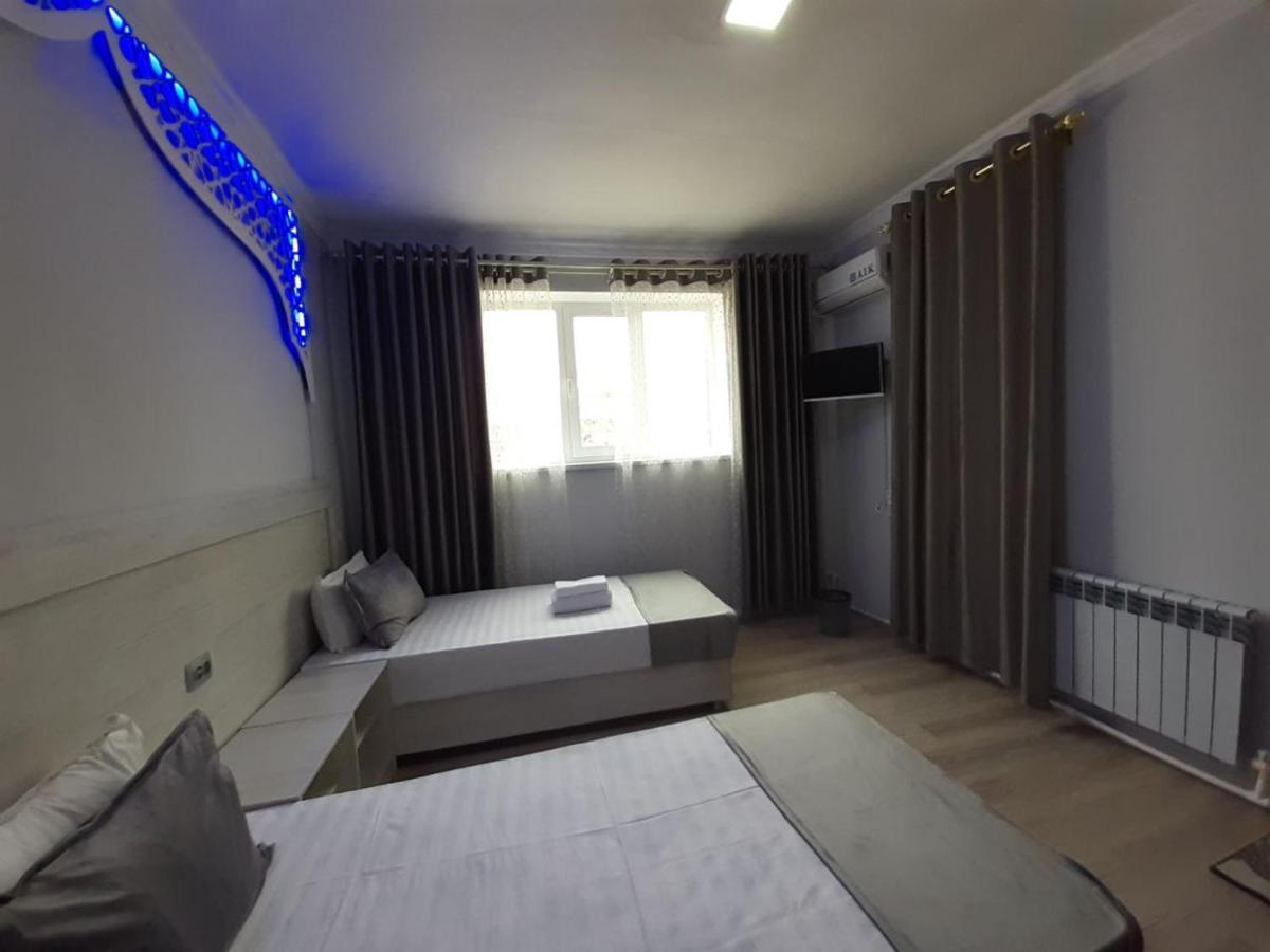 Hotel Rizqiro'Z Boutique Buhara Szoba fotó